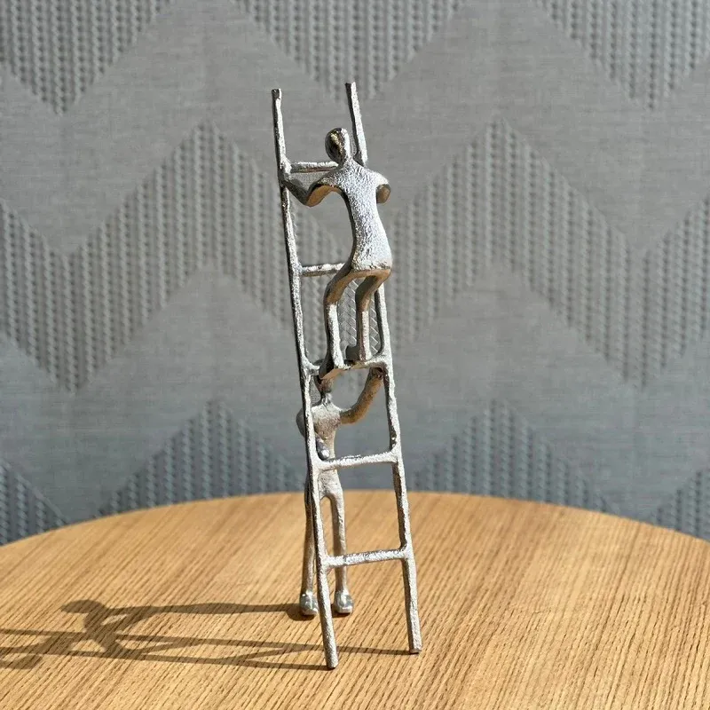 MAN WITH LADDER